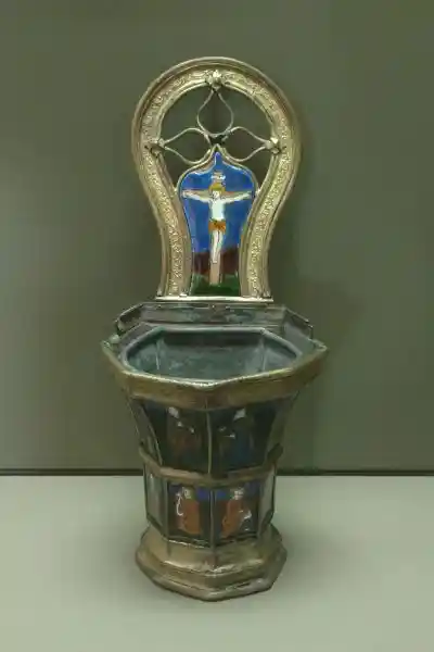 Crucifix on a basin